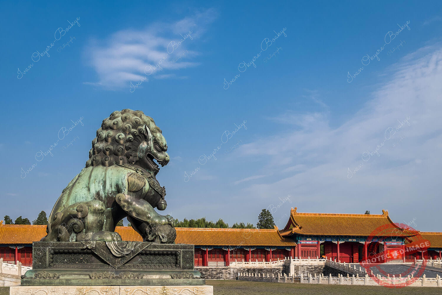 Male Bronze Guardian Lion in front of the Gate of Supreme Harmony in Forbidden City, Beijing, China