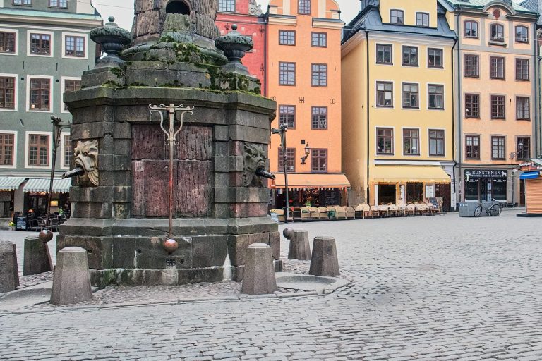 Stortorgsbrunnen water fountain in Stortorget square, Stockholm, Sweden